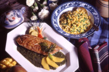 a plate with bronzed fish with mango spinach puree