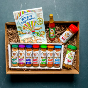 Magic seasoning gift box including Kitchen Expedition cookbook, seasonings, and pepper sauce