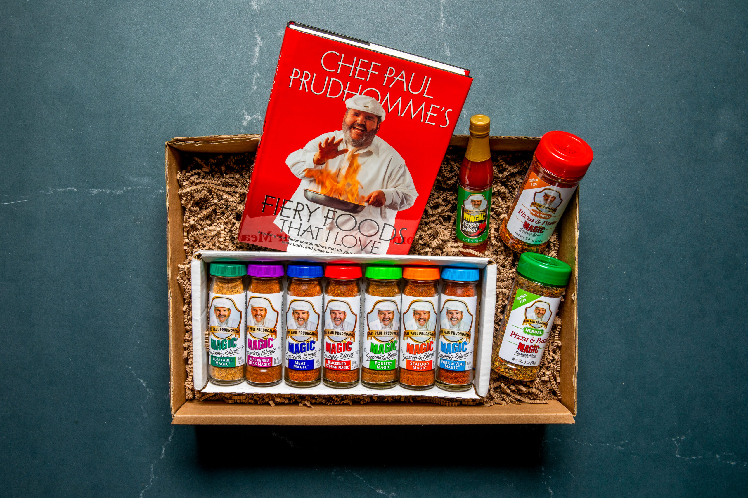 Magic seasoning gift box including Fiery Foods That I Love cookbook, seasonings, and pepper sauce