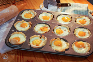 a cupcake pan of andouille and Egg Cups