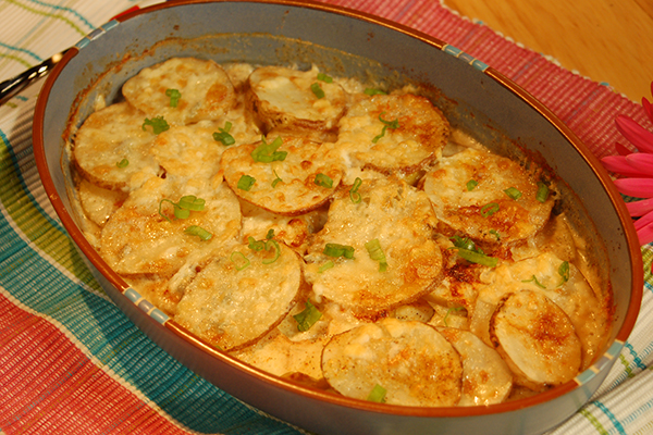 a bowl of potato gorgonzola gratin