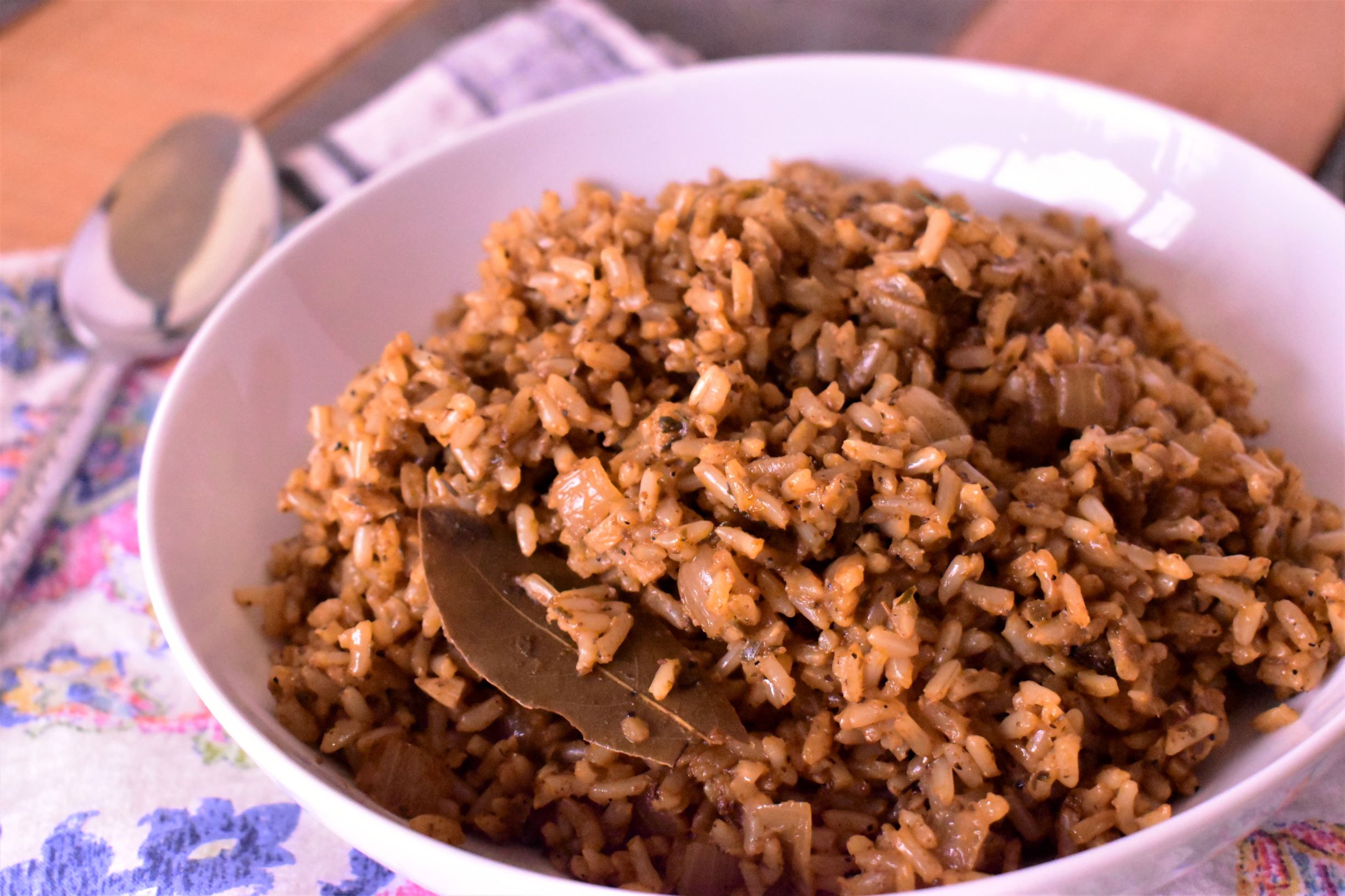 a bowl of rice pilaf with toasted onion and garlic