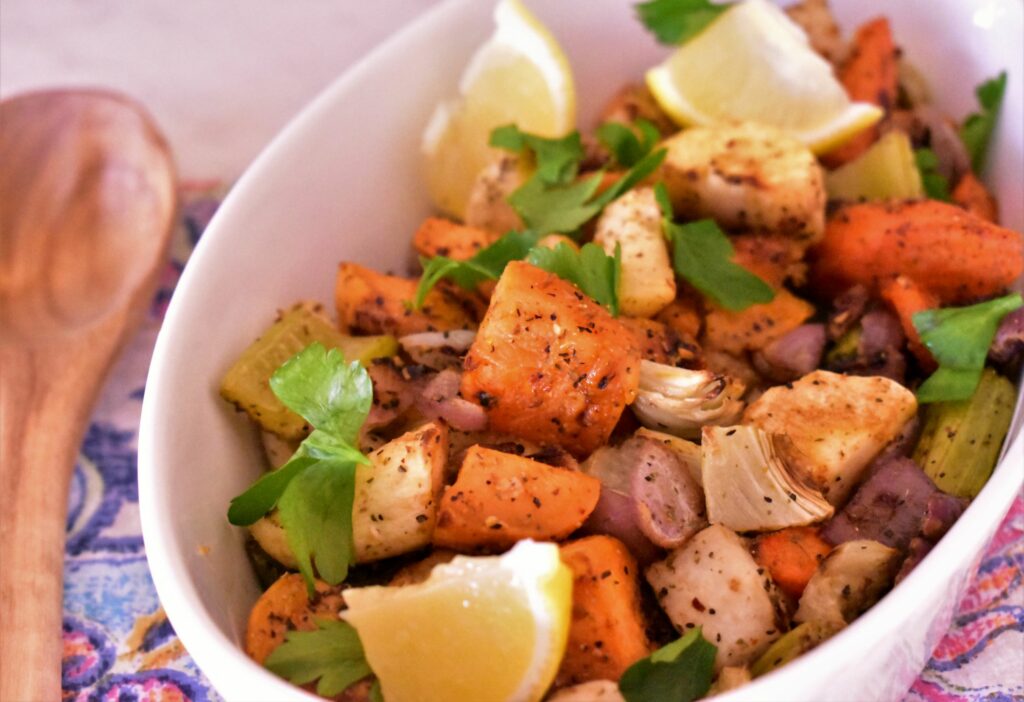 a bowl of roasted lemon peper winter vegetables with salt free sugar free magic seasoning blends