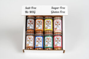 a box of the 8 salt free sugar free containers of seasoning magic