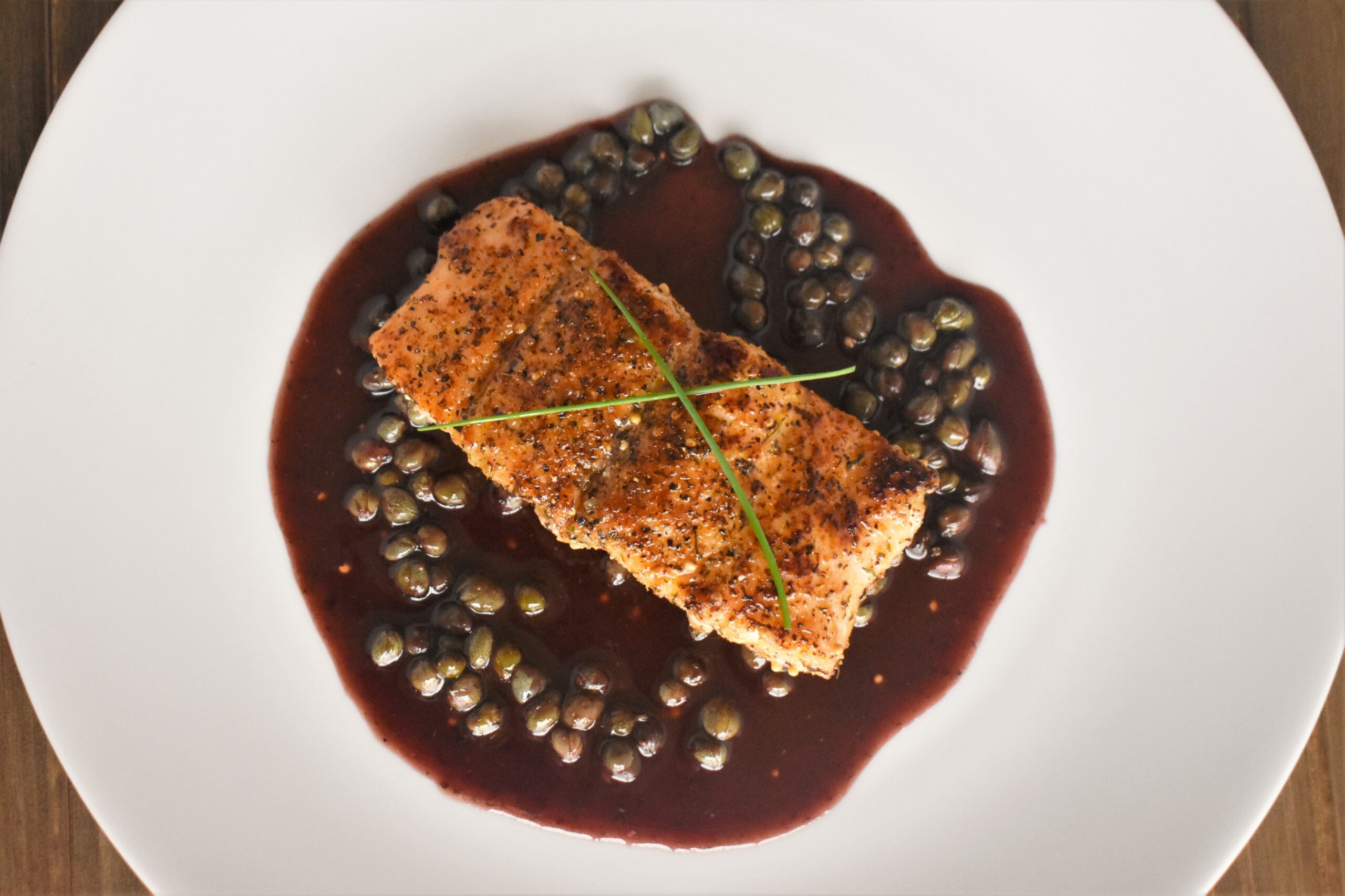 Bronzed Salmon with Merlot Caper Sauce