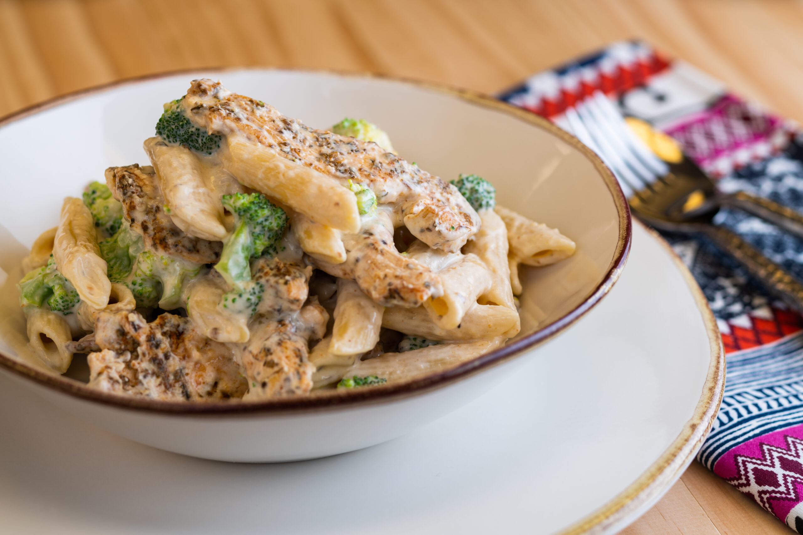 a plate of msgic chicken alfredo cooked with salt free sugar free magic seasoning blends