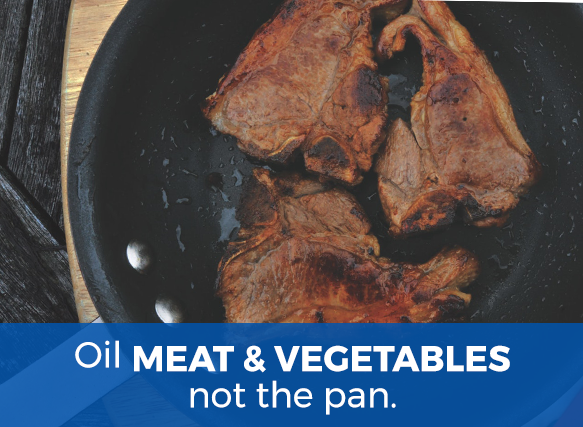 a cast iron pan wwith 3 pork chops in it cooking with the text "oil meat and vegetables, not the pan." on it
