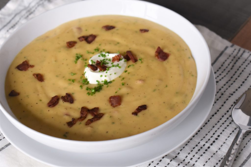 a plate of instapot garlicky loaded potato soup