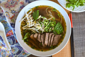 a bowl of instapot pressure cooked Beef Pho