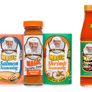 Chef Paul Prudhomme’s Magic Seasoning Blends products displayed on a white background: Salmon Magic seasoning, a bottle of Seafood Magic seasoning blend, and a large container of Magic Shrimp Seasoning, alongside a bottle of Magic Pepper Sauce labeled “Free Pepper Sauce.”