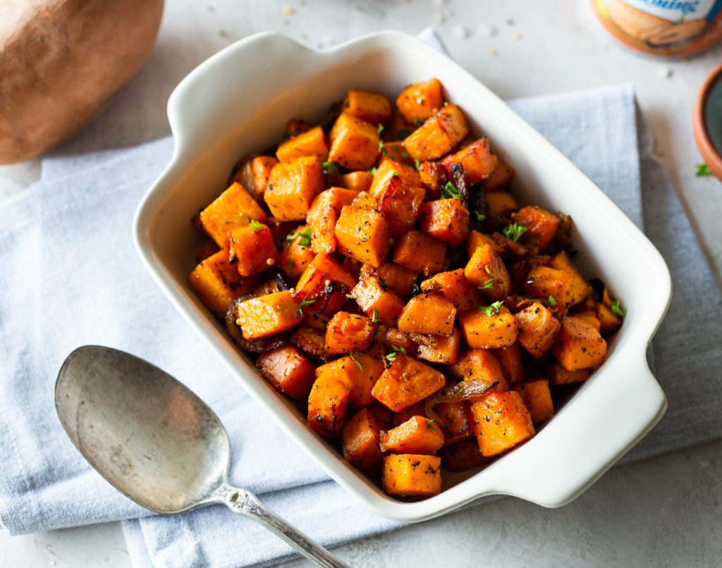 a dish full of salmon magic sweet potatos