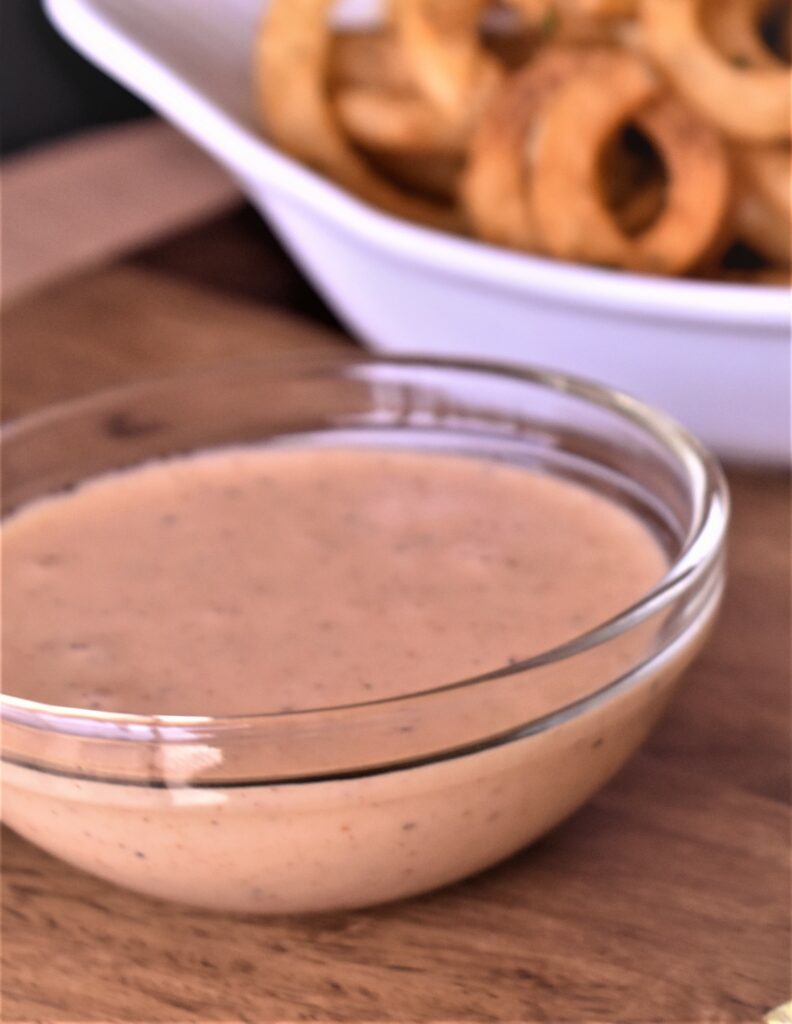 a cup of buttermilk sriracha mayo