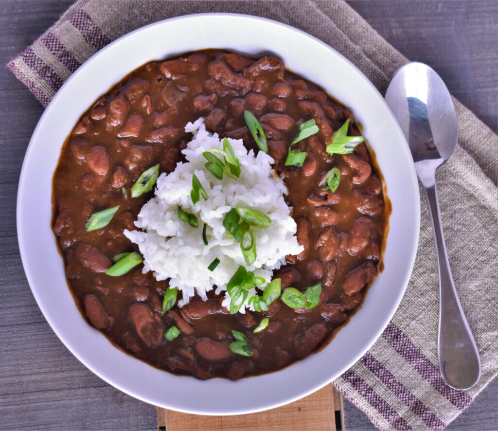 a plate of vegan plant based creole red beans and rice