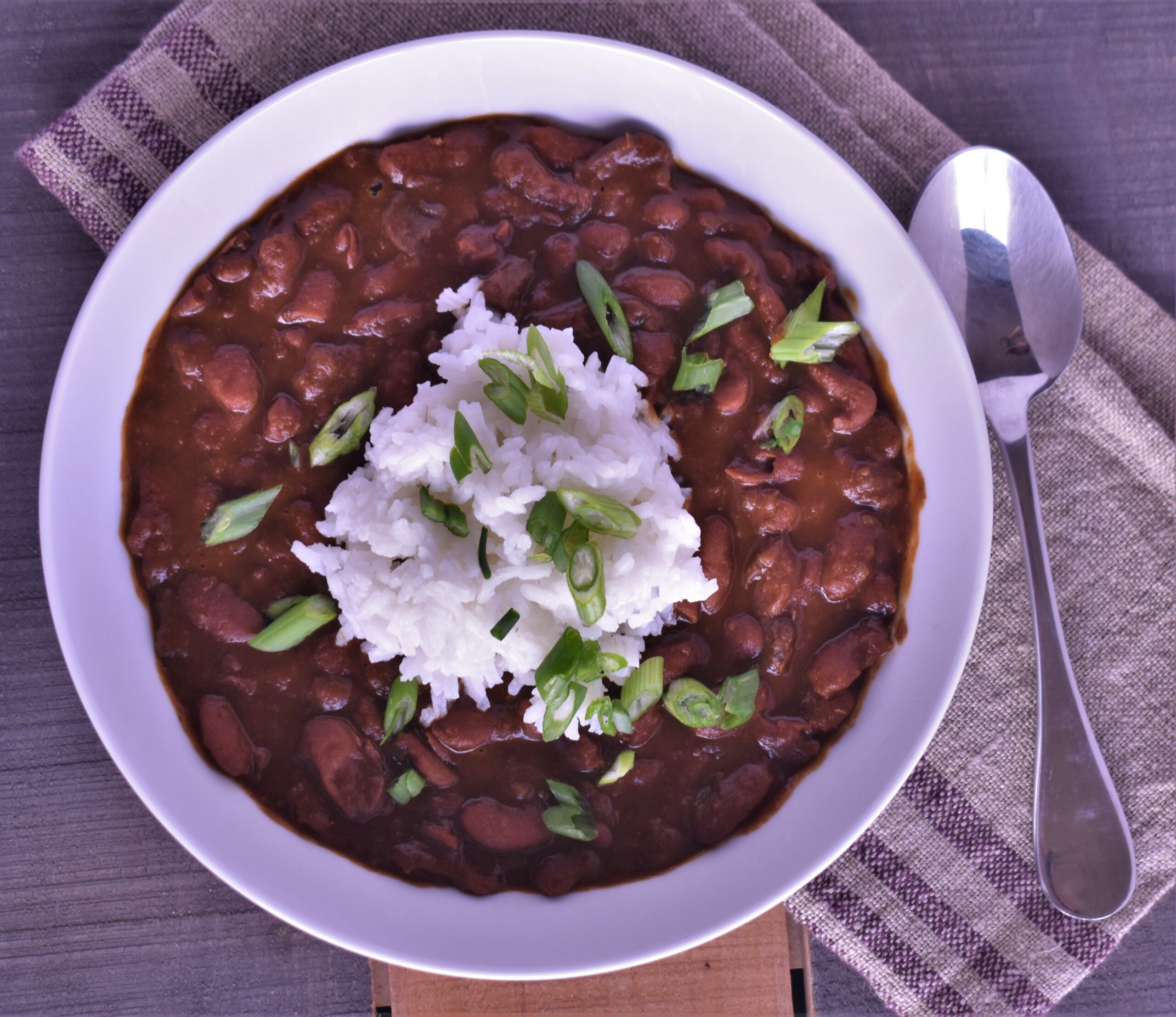a plate of vegan plant based creole red beans and rice