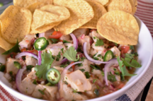 a plate of ceviche and a side of chips
