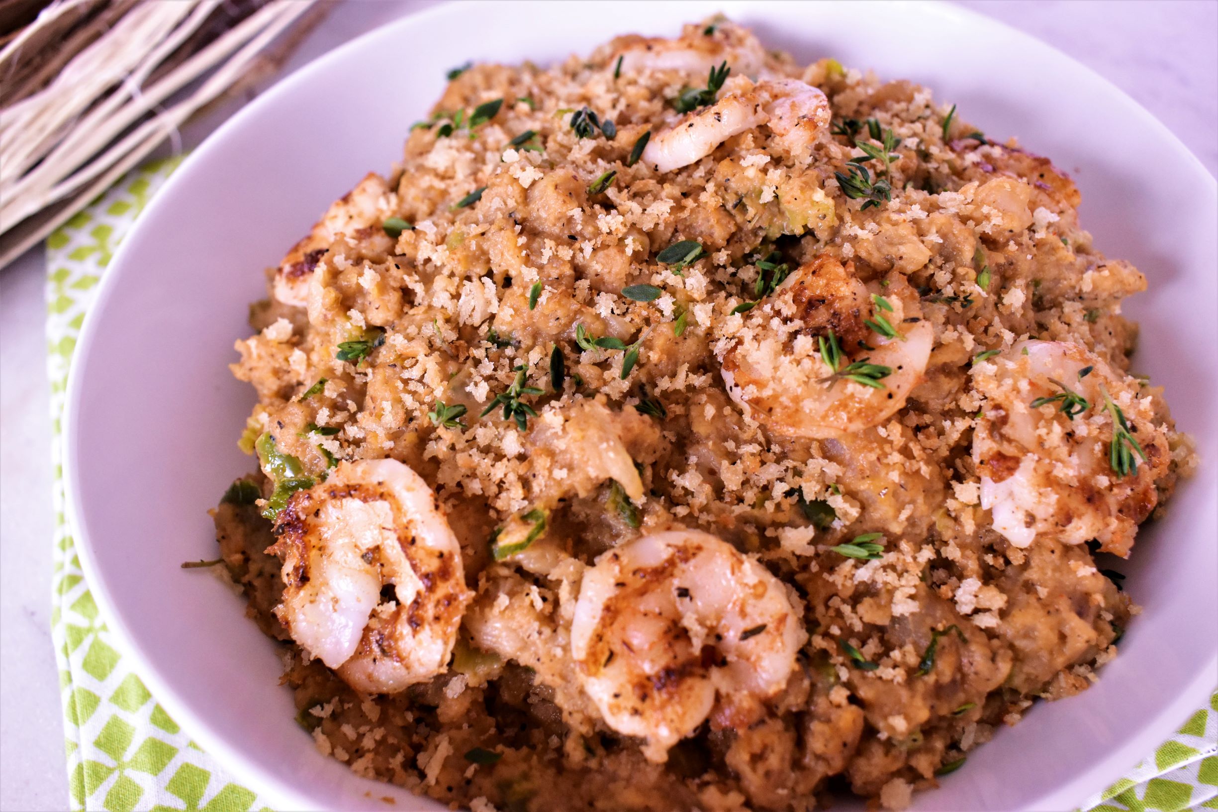 a bowl of shrimp dressing with cilantro