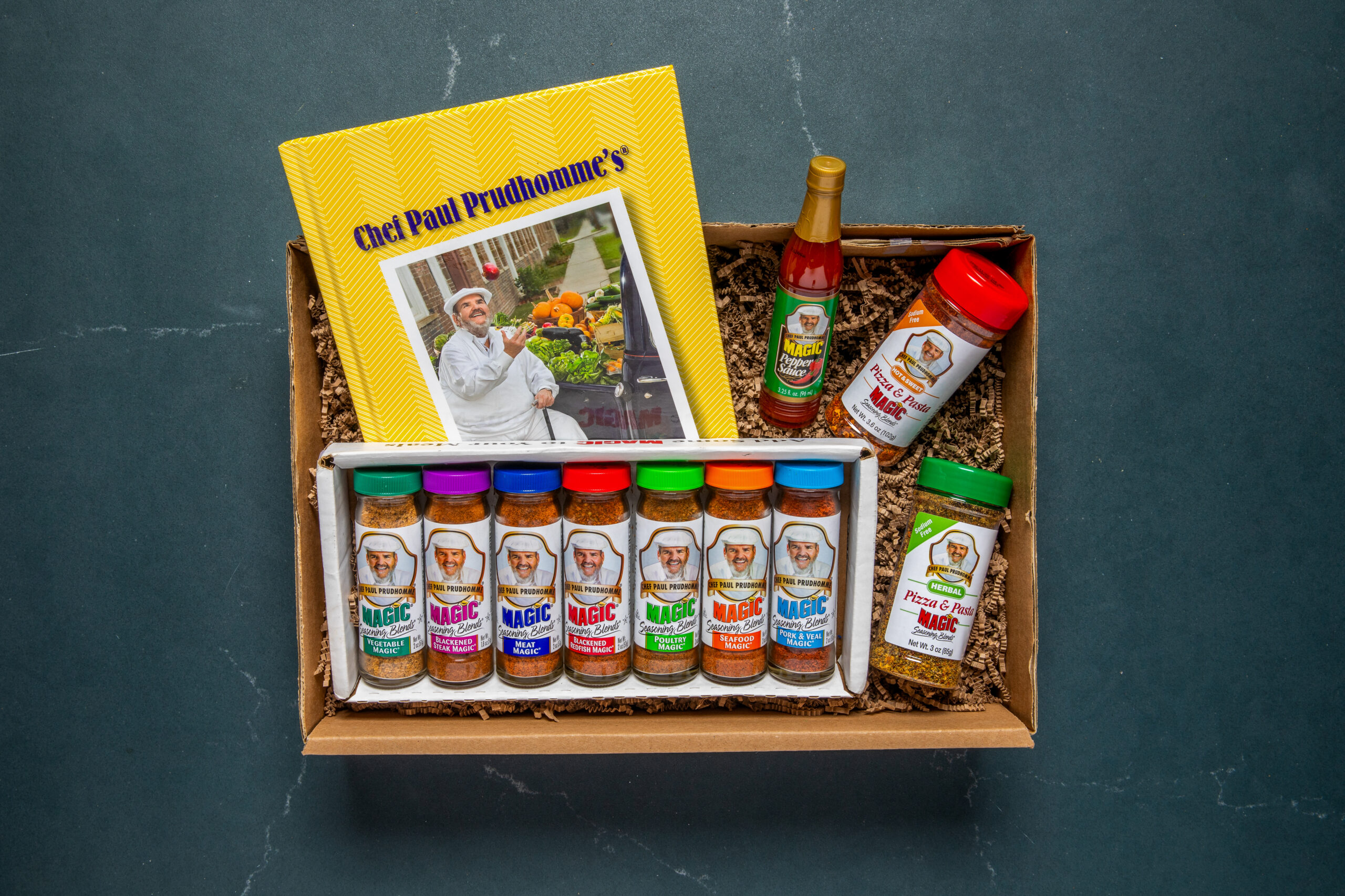 Magic seasoning gift box including Always Cooking! cookbook, seasonings, and pepper sauce